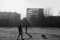 Man-walking-dog-man-contemplating-BnW