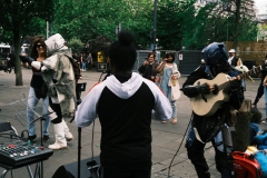 Scouttrooper-dances-with-woman-cosplayer-strums-guitar