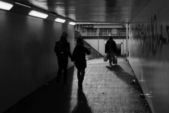 woman-carrying-shopping-salford-precinct-underpass