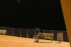 woman-smoking-upon-bench